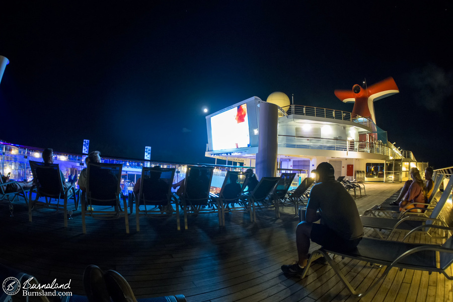 Watching a movie on the ship.