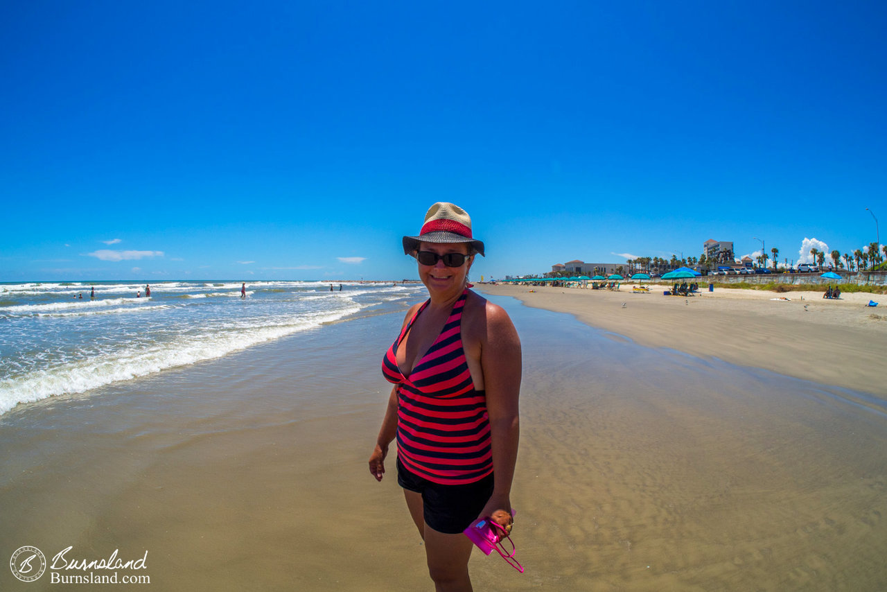 Laura was chilling at the beach. Actually, we were sweating some. But that’s what the water is for.