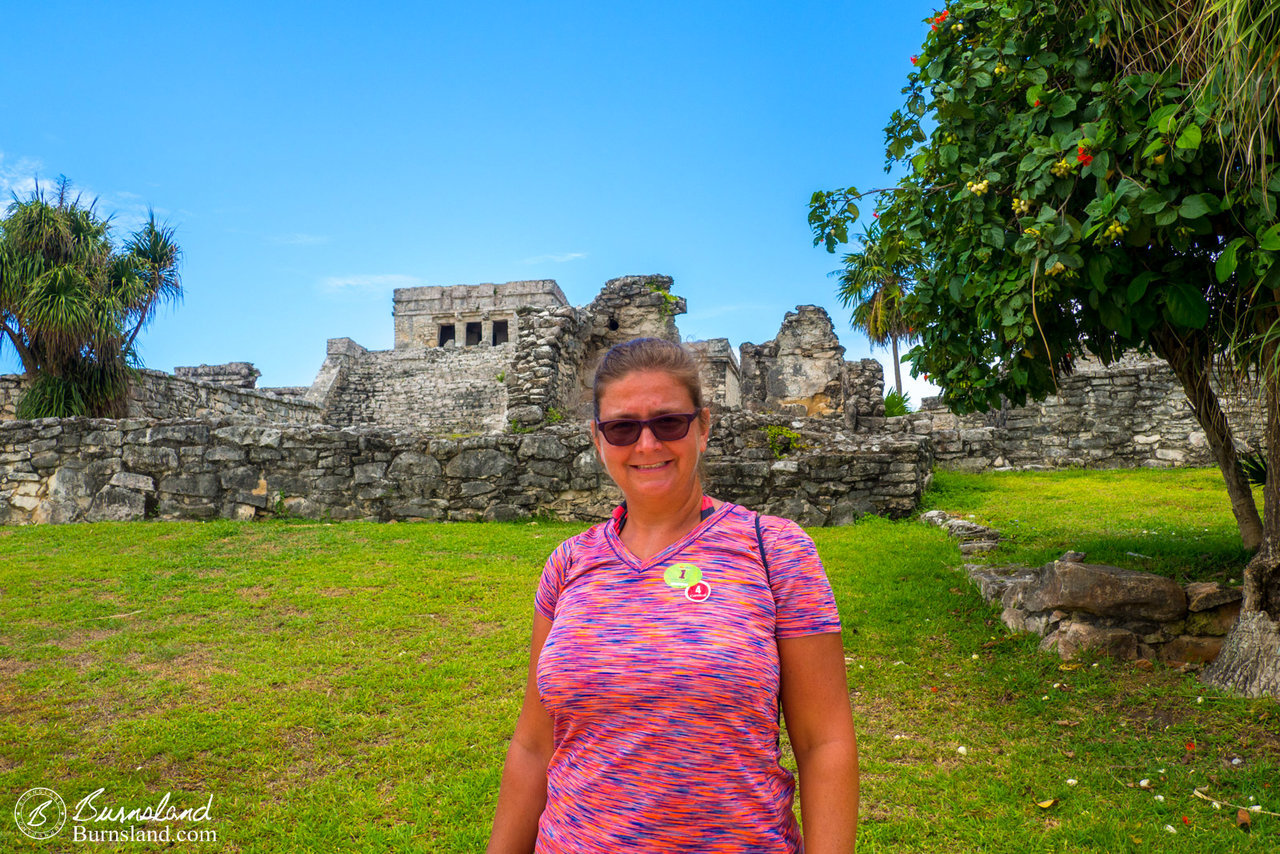 Laura with the ruins of El Castillo behind her.