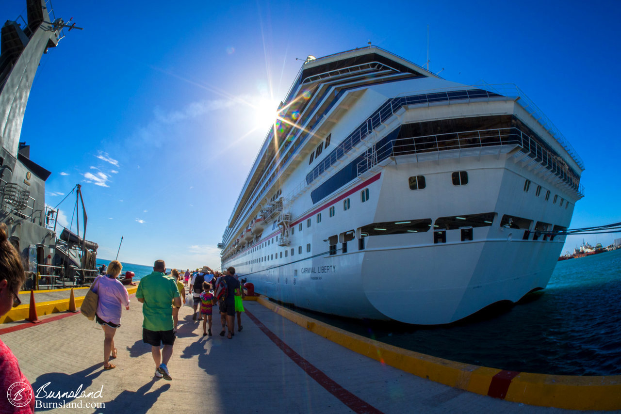 Walking back to the ship, and enjoying its shade.