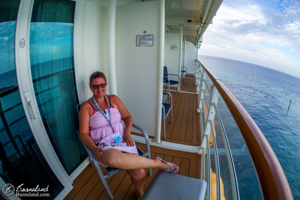 Laura enjoys the view from the verandah in the morning