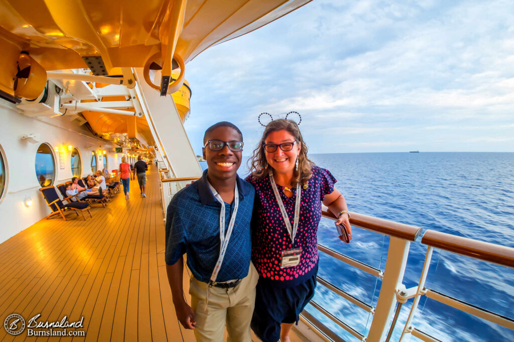 Laura and Jaylin enjoying the evening on the Deck 4 Promenade of the Disney Dream.