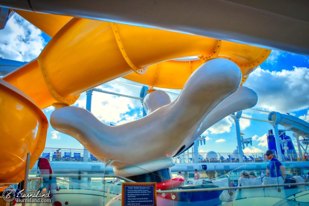 Walking past the Mickey slide  during our Disney Cruise. That’s a mighty big hand.