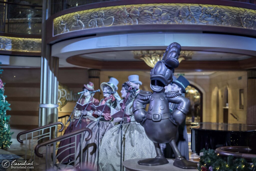 Admiral Donald Duck and the Christmas Carolers on the Disney Dream cruise ship