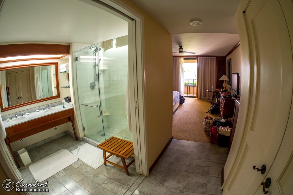 The bathroom and shower, with the bedroom beyond. Yes, there were sliding doors to close off the bathroom.