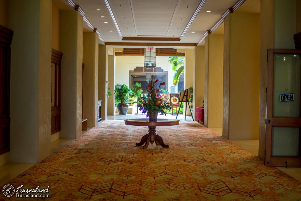 A look down the hallway of the hotel. If you look closely, you can see raindrops in the open area at the end of the hall.