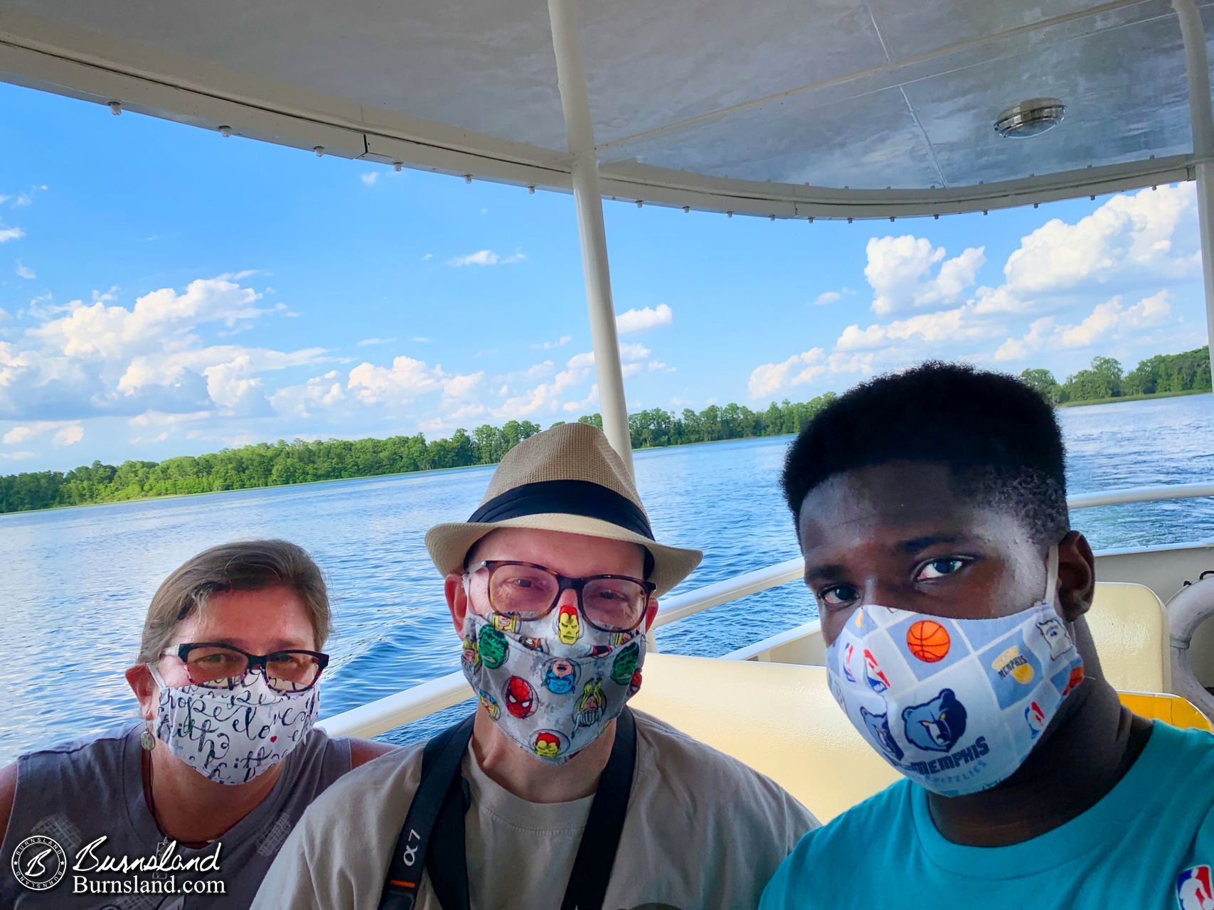 Laura, Steve,, and Jaylin on the boat