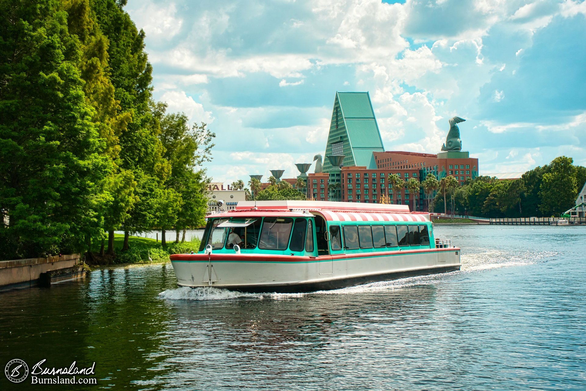 A Friendship boat passes by as we walk along the Epcot Resorts walkway, with the Walt Disney World Dolphin in the background. You may remember that I posted a photo earlier with a Friendship boat and the Walt Disney World Swan. Yes, I like these kinds of photos, if you can’t tell.