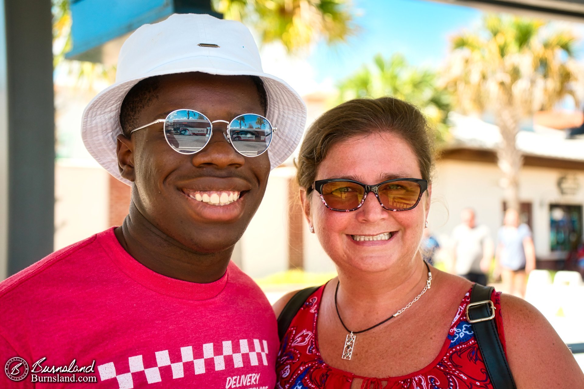 Jaylin and Laura at Disney Springs waiting for the bus