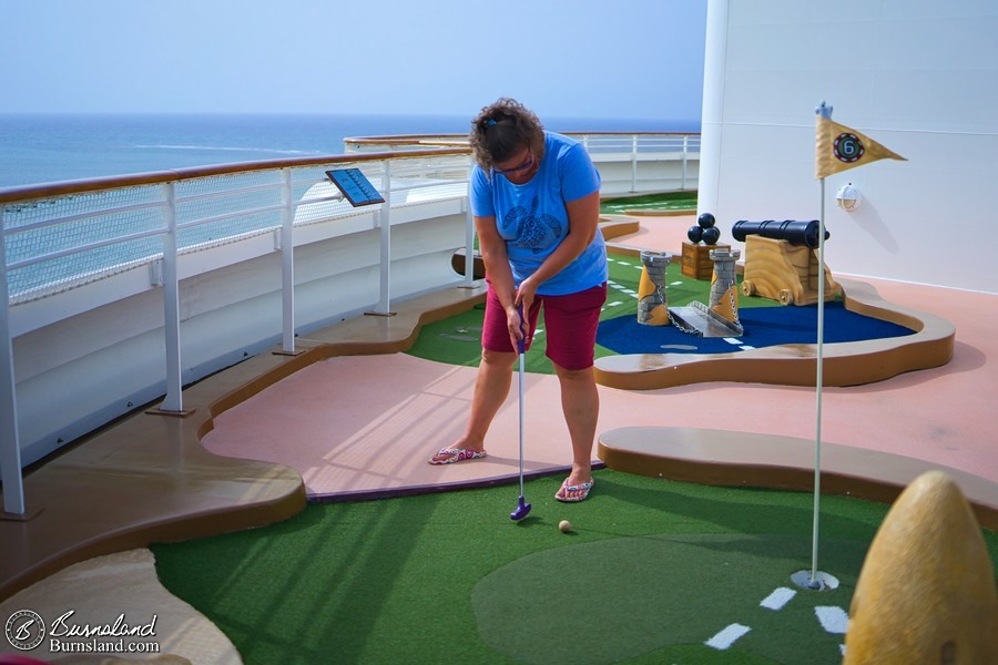 Playing miniature golf on the Disney Fantasy