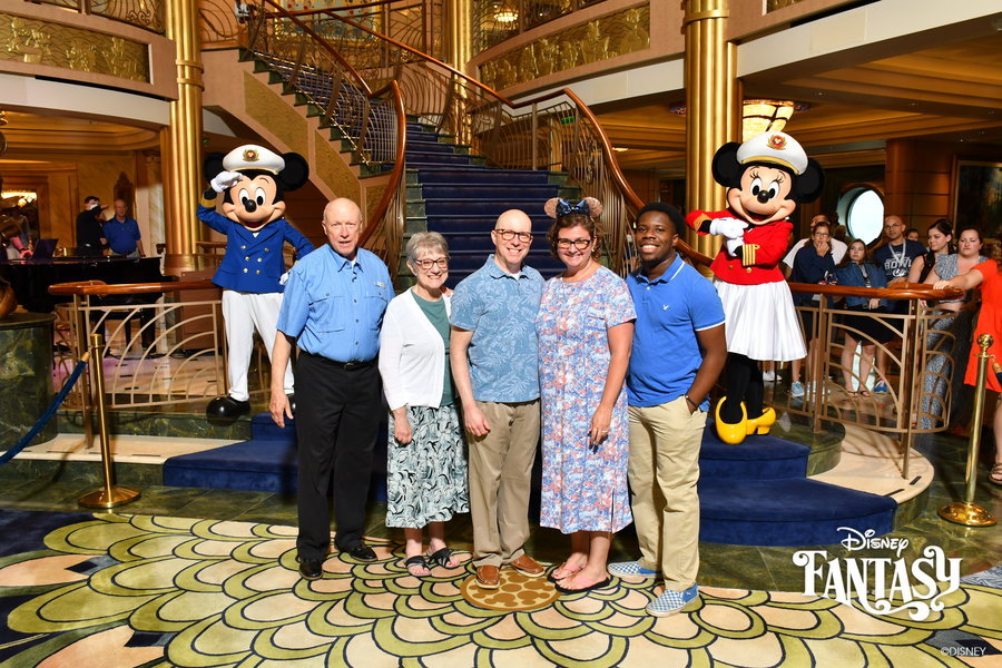 With Mickey and Minnie! And some people waiting patiently in the background. I wonder how many people’s pictures we were in the background for?