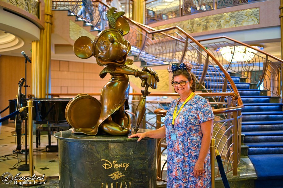 Laura and the Minnie Mouse statue in the Atrium Lobby of the Disney Fantasy