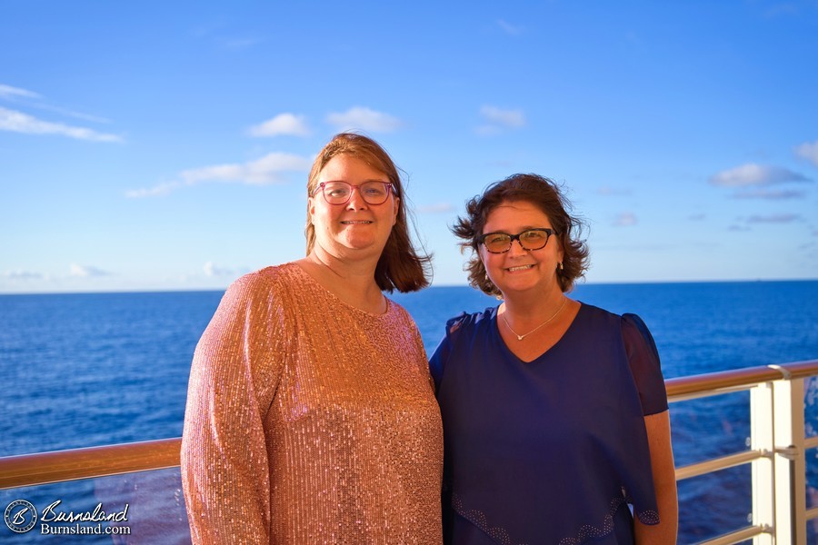 Jennifer and Laura looking formal at sunset