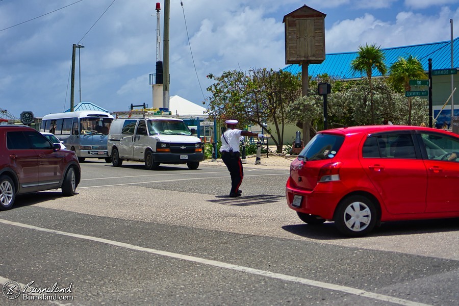 A crossing guard in George Town, Grand Cayman