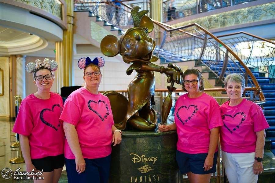 With the Minnie Mouse statue in the Atrium Lobby