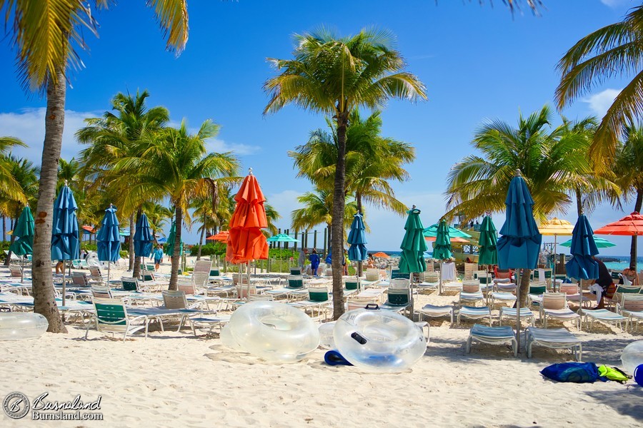 Folded beach umbrellas on Castaway Cay, the Disney Cruise Line’s Bahamas island