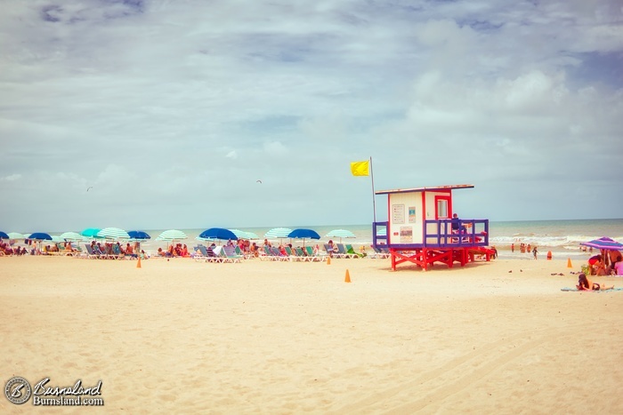 Lifeguard hut and beach umbrellas at Cocoa Beach, Florida