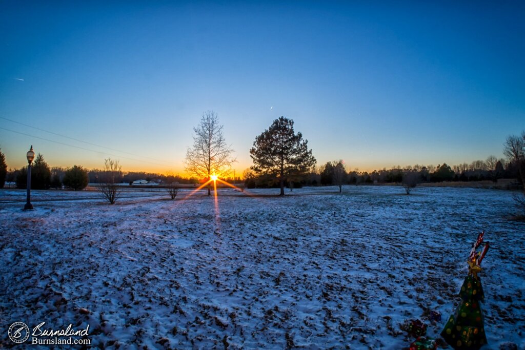 Sunset and snow in our front yard