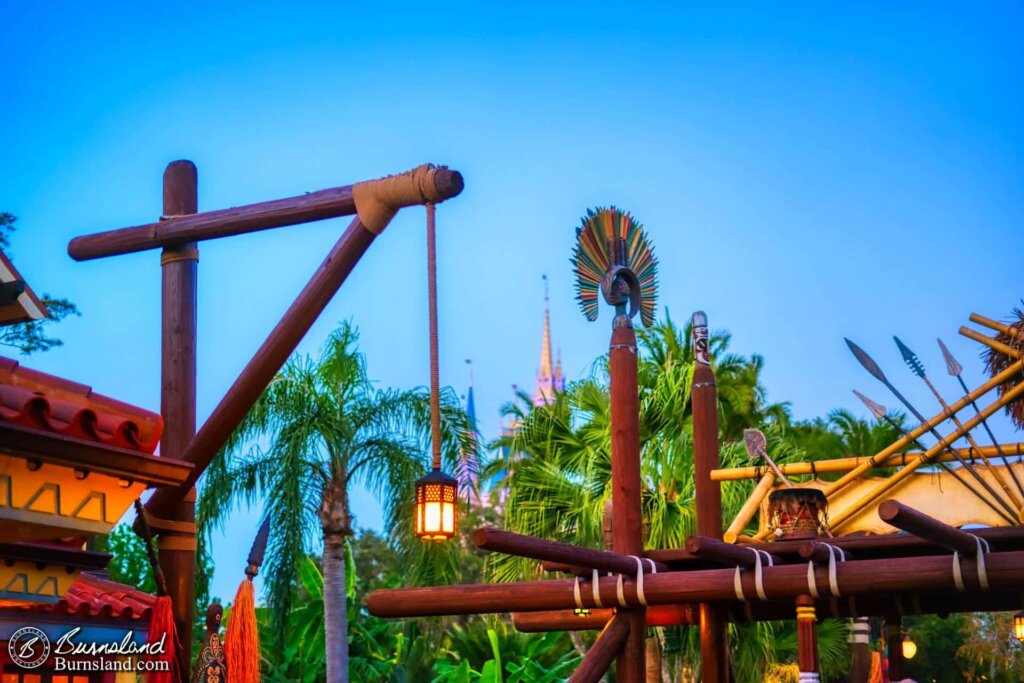 Tribal elements and an interesting light fixture mark the entrance to Adventureland in the Magic Kingdom at Walt Disney World