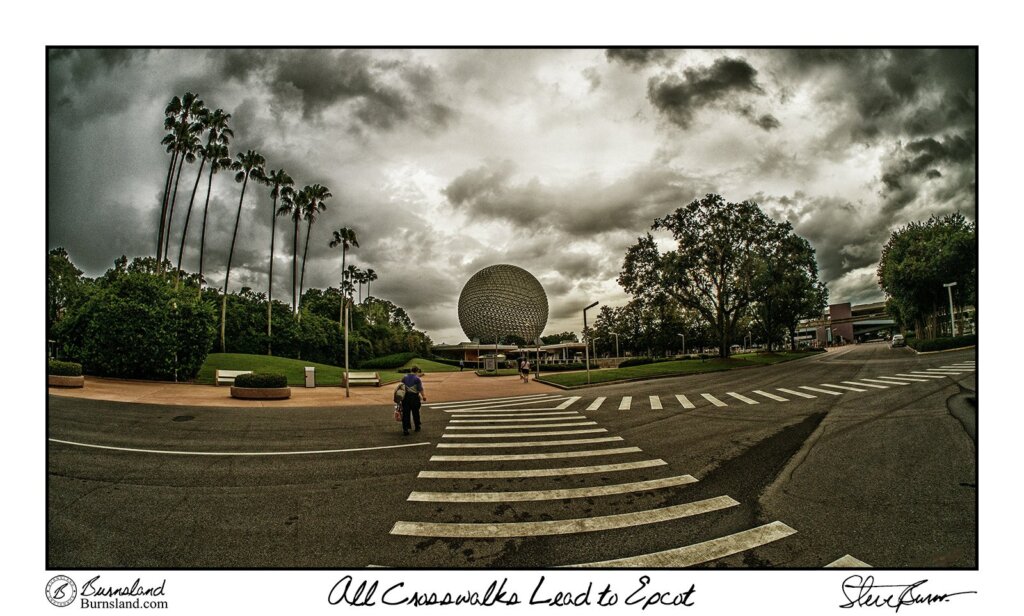 Crosswalks across drive lanes seemingly lead to Spaceship Earth in Epcot at Walt Disney World, as some dark clouds hang in the sky overhead.