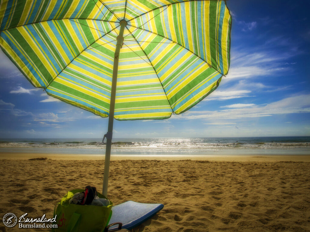 Beach Umbrella Lit By the Sun at Cocoa Beach, Florida