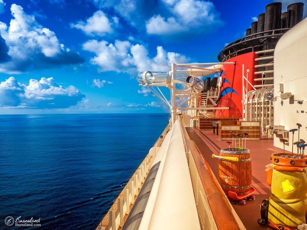 The blue sky and blue water add to a perfect day at sea on the Disney Dream, one of the ships of the Disney Cruise Line. Read all about it at Burnsland.