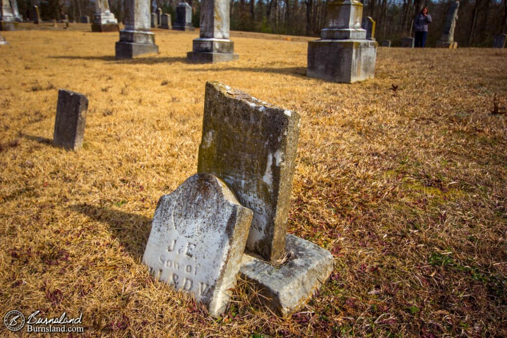 A broken tombstone in the White Sulphur Cemetery at Pickwick Landing State Park