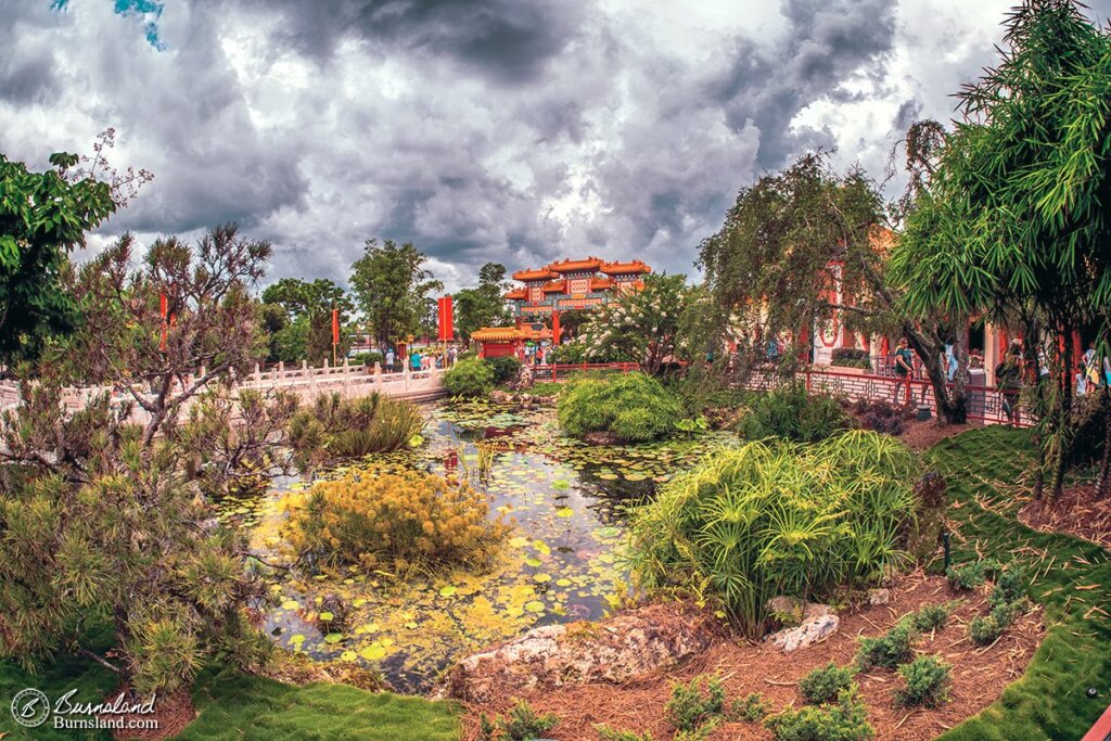 Storm clouds hover above a Chinese garden at the China Pavilion in Epcot’s World Showcase at Walt Disney World. Read all about it at Burnsland!