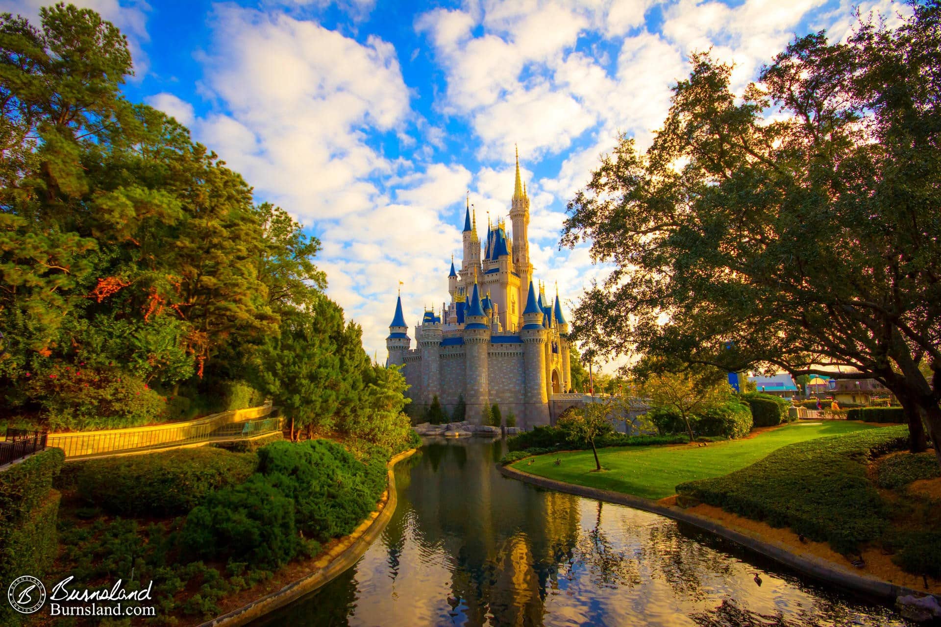 The late afternoon sun lights up Cinderella Castle in Walt Disney World’s Magic Kingdom