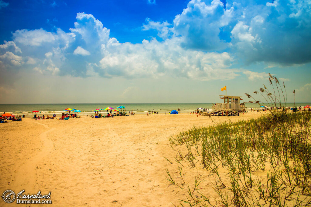 Clouds dominate the sky above the beach at Lori Wilson Park in Cocoa Beach, Florida