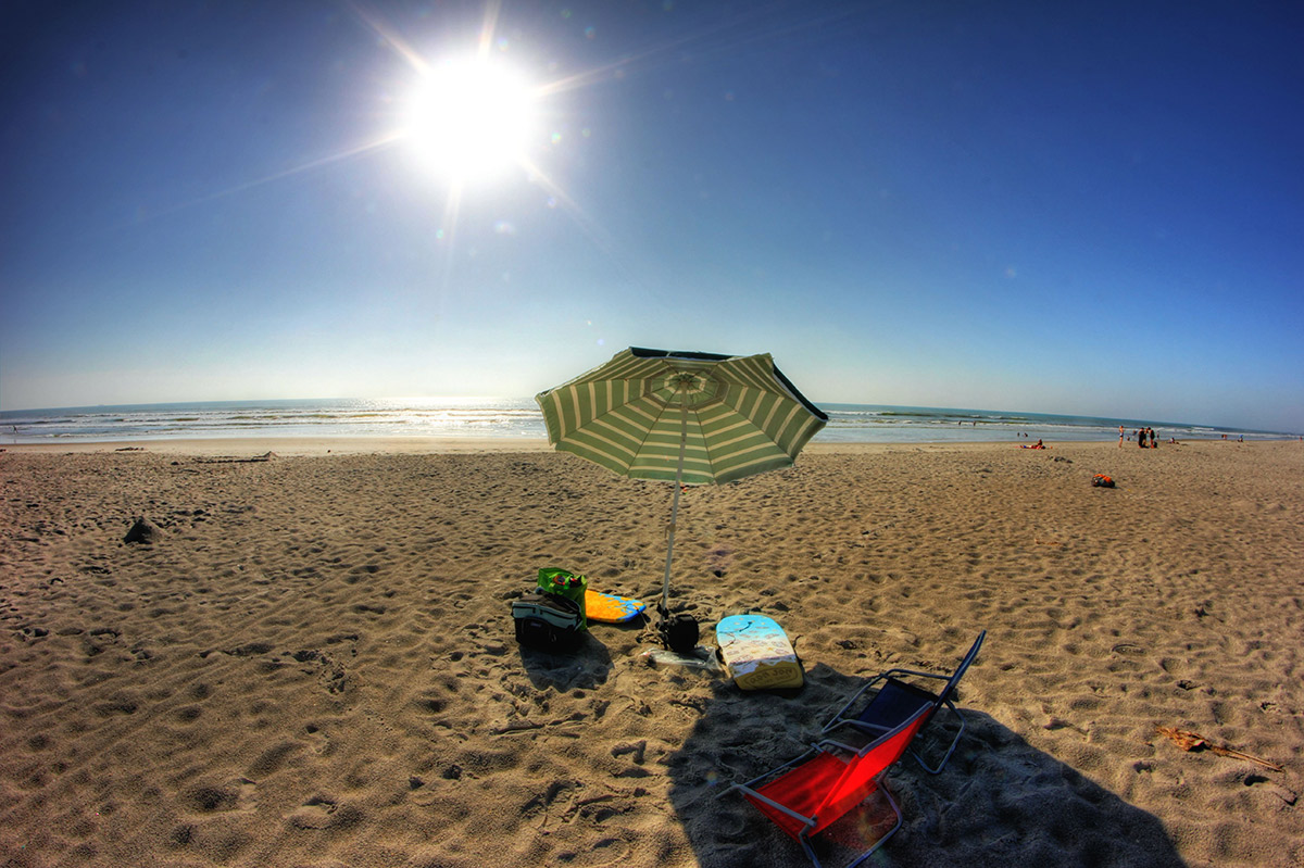 Our beach umbrella in the sun at Cocoa Beach, Florida