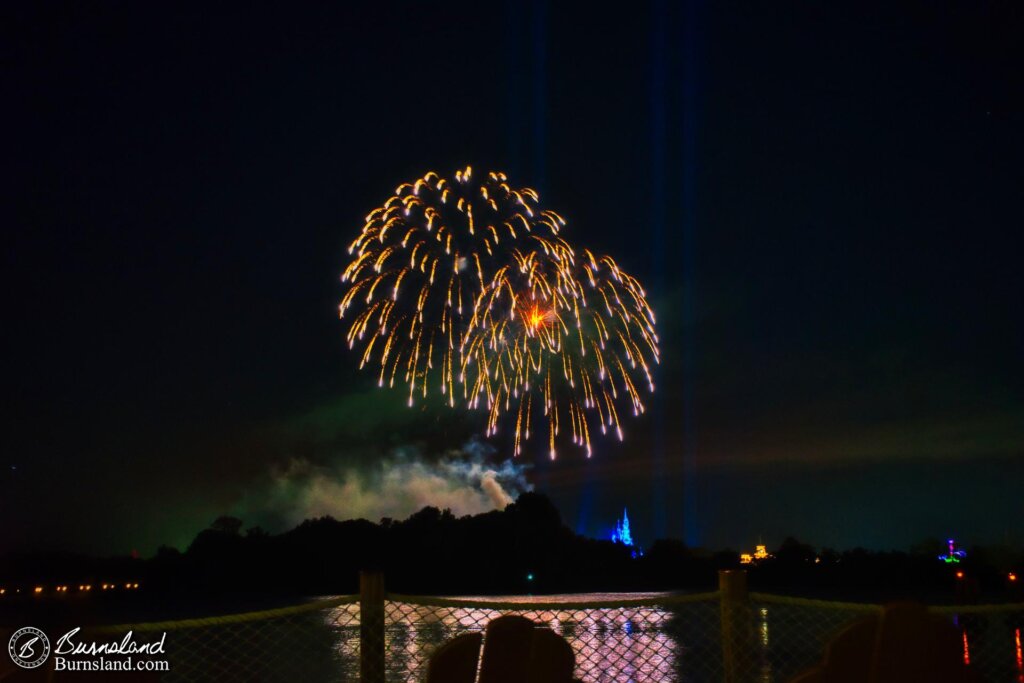 Fireworks explode over the Magic Kingdom at Walt Disney World as seen from across Seven Seas Lagoon at the Polynesian Village Resort