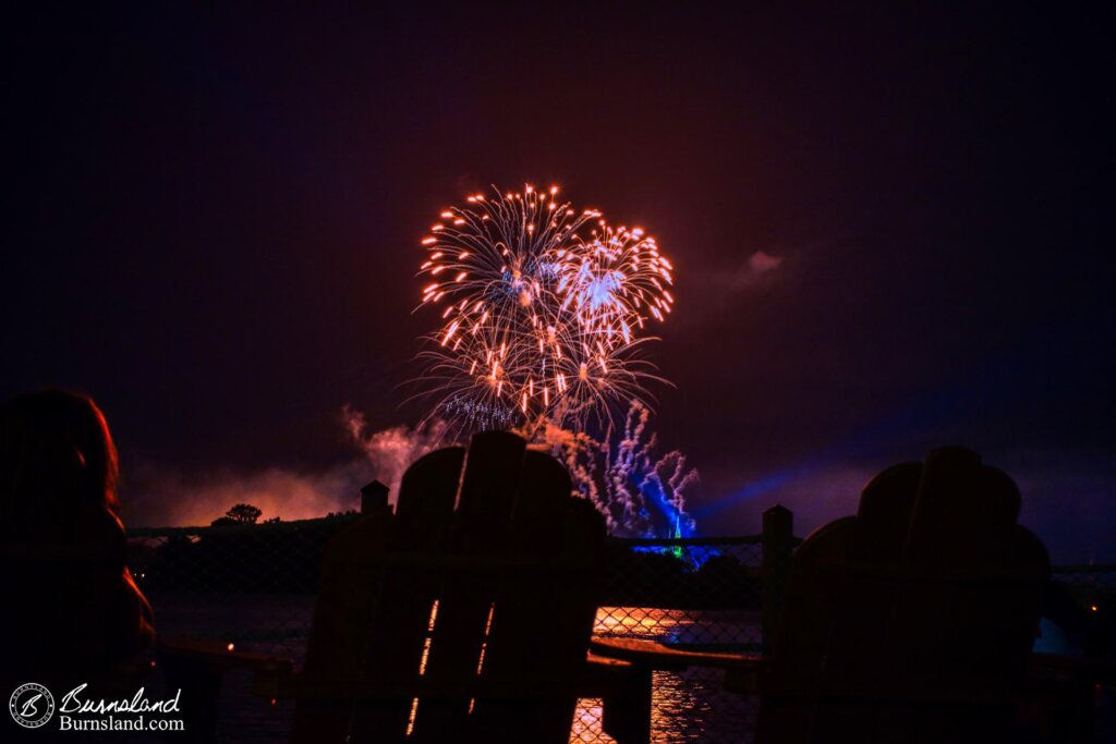 Fireworks explode over the Magic Kingdom at Walt Disney World as seen from across Seven Seas Lagoon at the Polynesian Village Resort