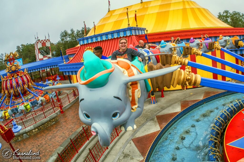 Laura and Jaylin and Dumbo in the Magic Kingdom