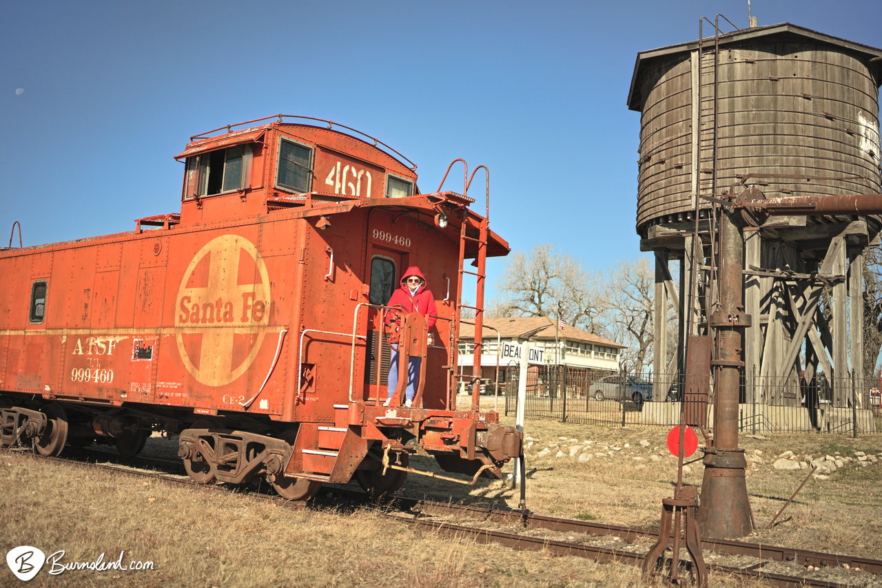 Santa Fe caboose and Frisco water tower in Beaumont, Kansas