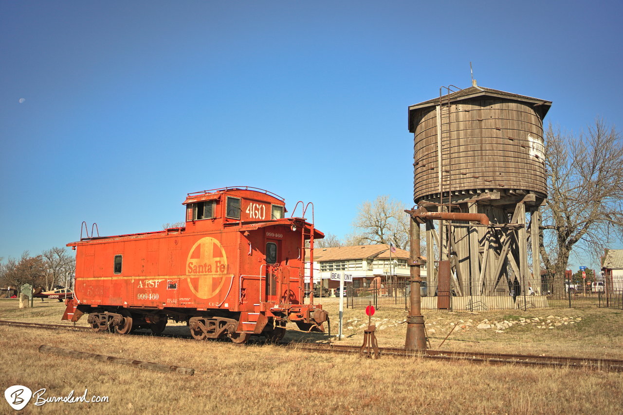 Santa Fe caboose and Frisco water tower in Beaumont, Kansas