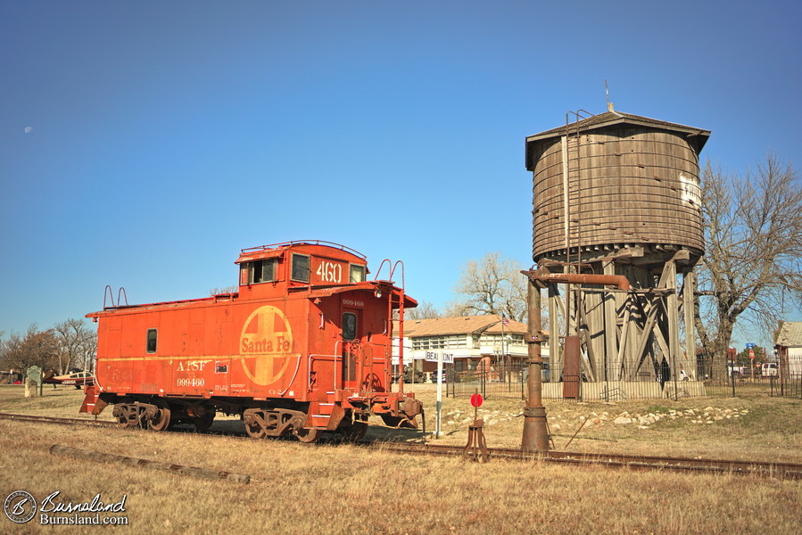 Santa Fe caboose and Frisco water tower in Beaumont, Kansas