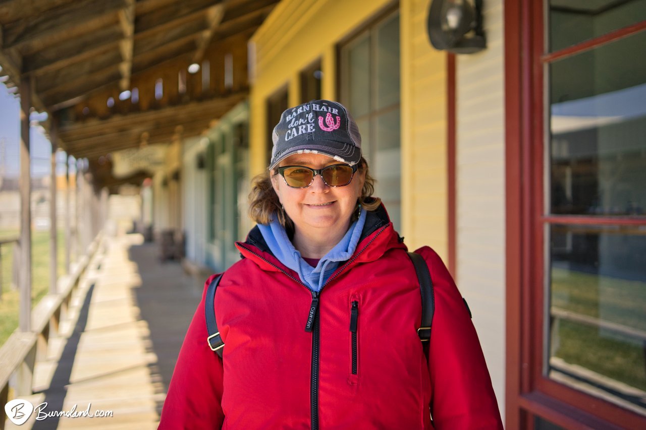 Laura on the wooden sidewalks of Front Street in Dodge City, Kansas