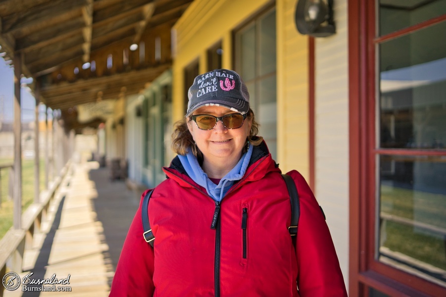 Laura on the wooden sidewalks of Front Street in Dodge City, Kansas