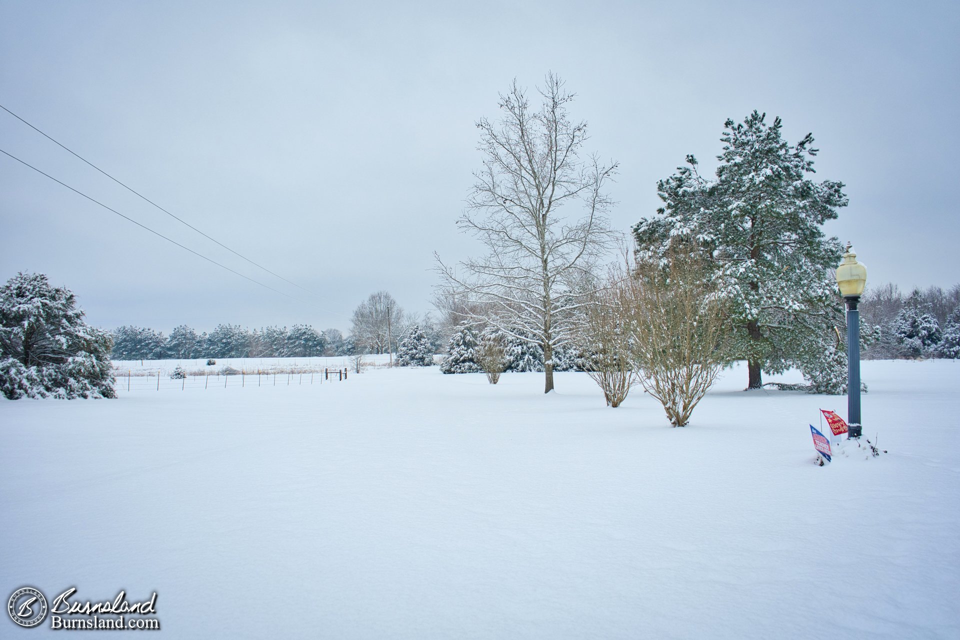 A view down the driveway after more snow