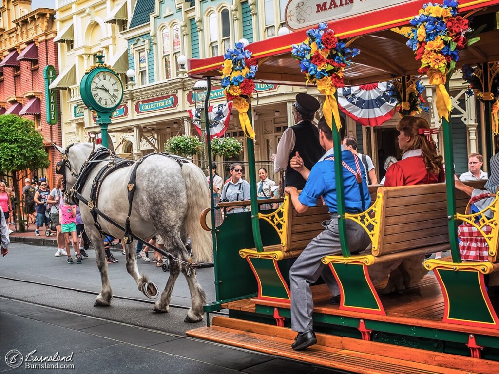 A horse pulls a trolley down Main Street USA in Walt Disney World’s Magic Kingdom. Read all about it at Burnsland.