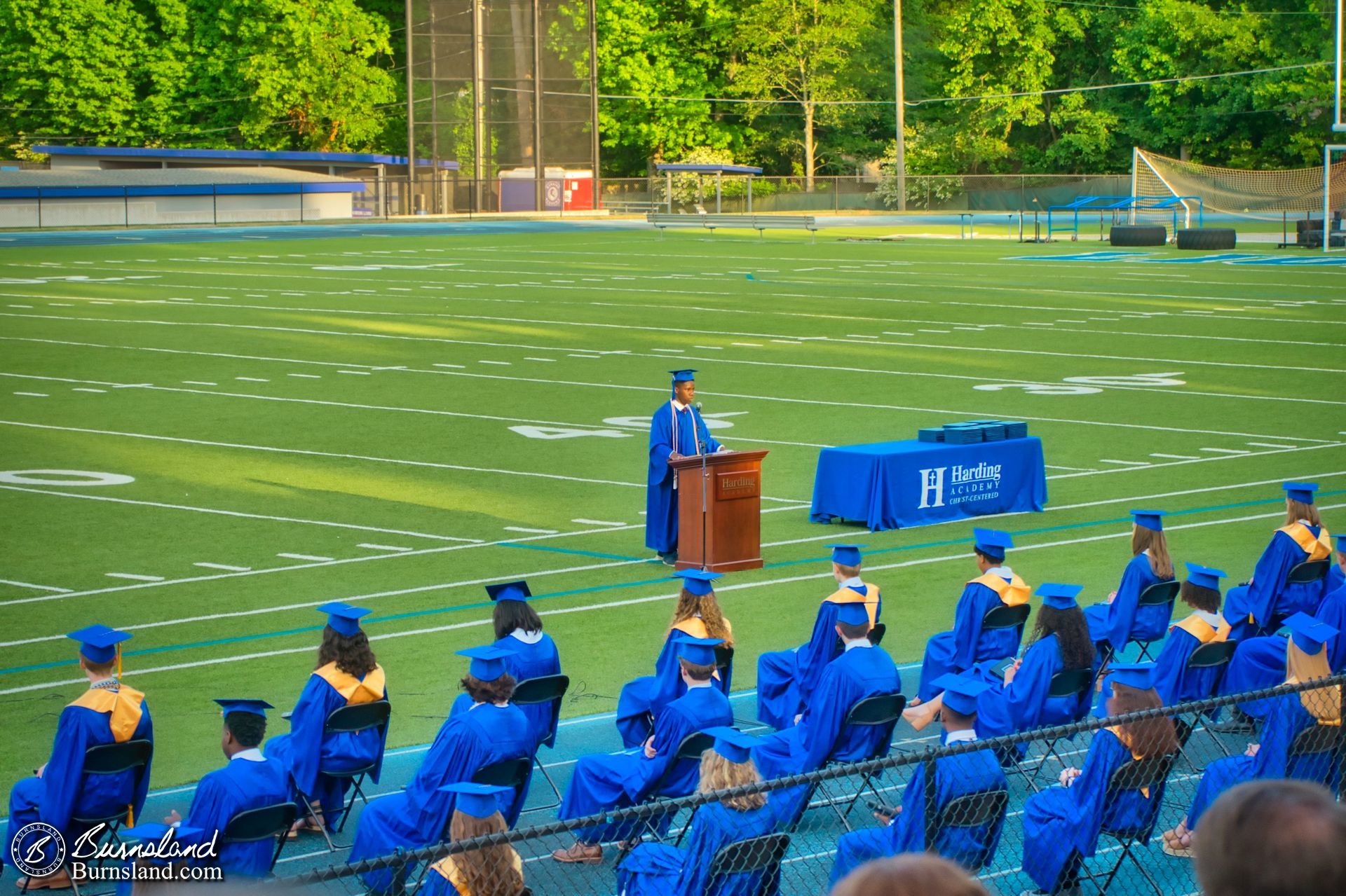 Jaylin leads a prayer during graduation