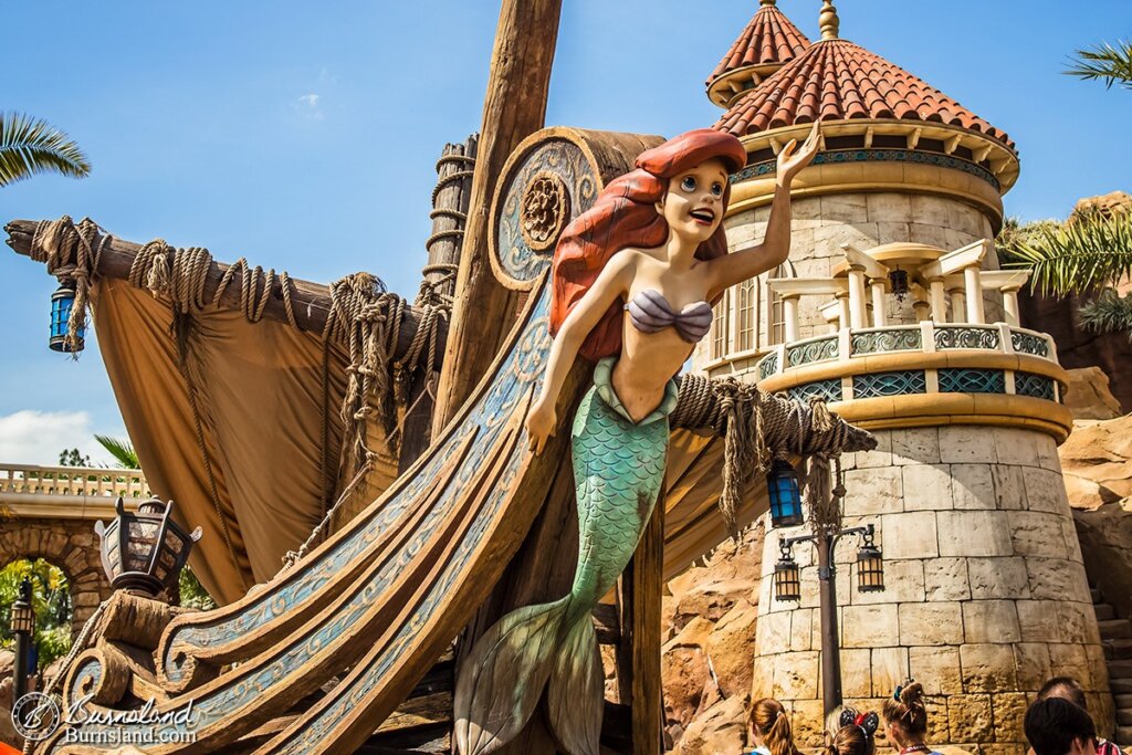 Ariel, the Little Mermaid, outside of her attraction in the Magic Kingdom at Walt Disney World. Read all about it at Burnsland!