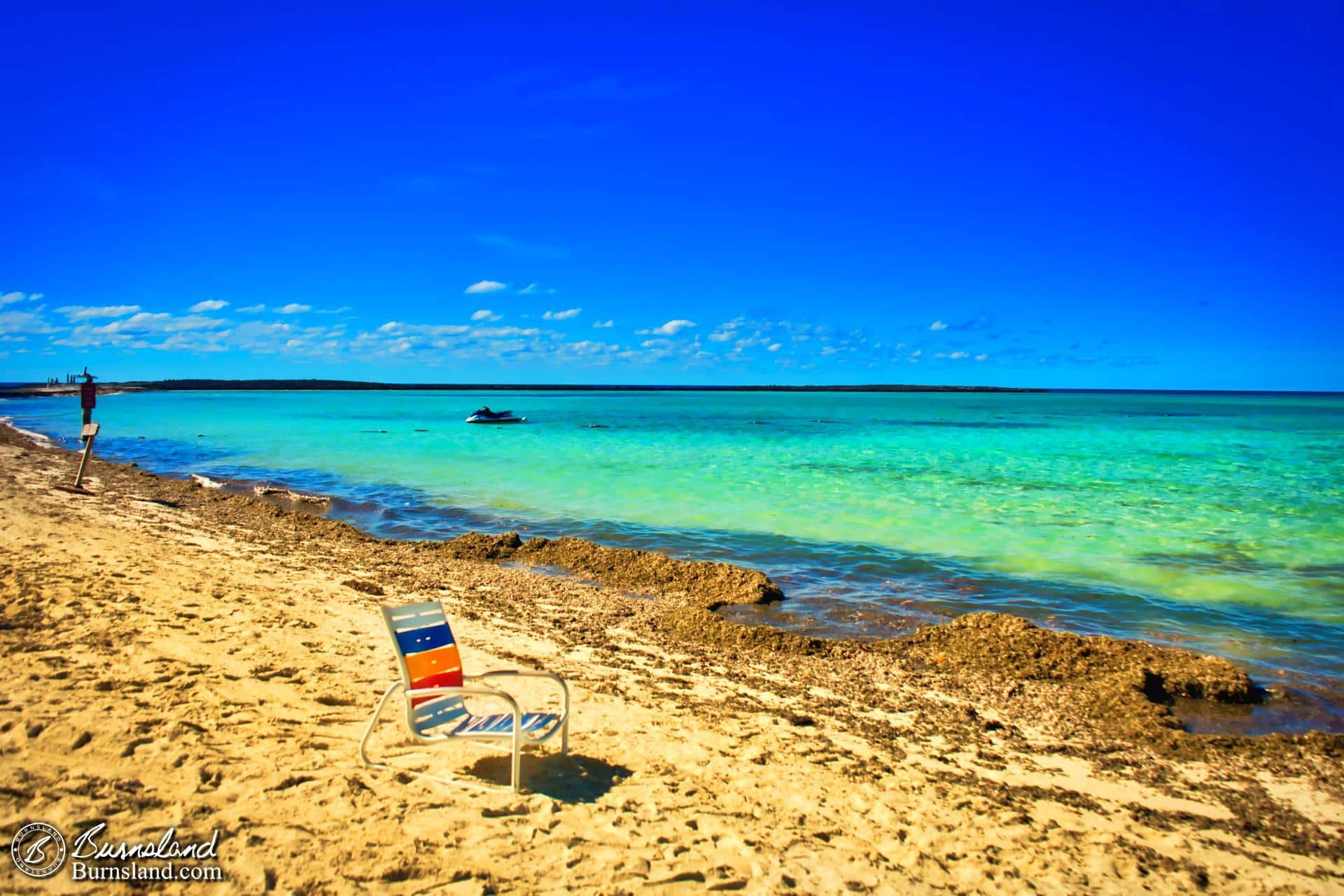 Lonely Beach Chair at Castaway Cay, the Disney Cruise Line island in the Bahamas