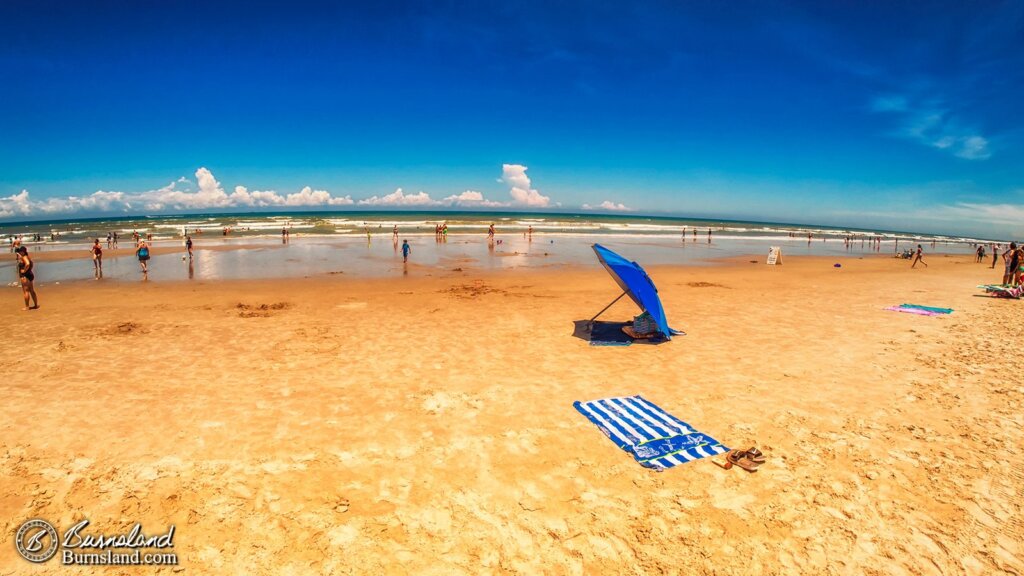 Beach towel and umbrella at Cocoa Beach, Florida