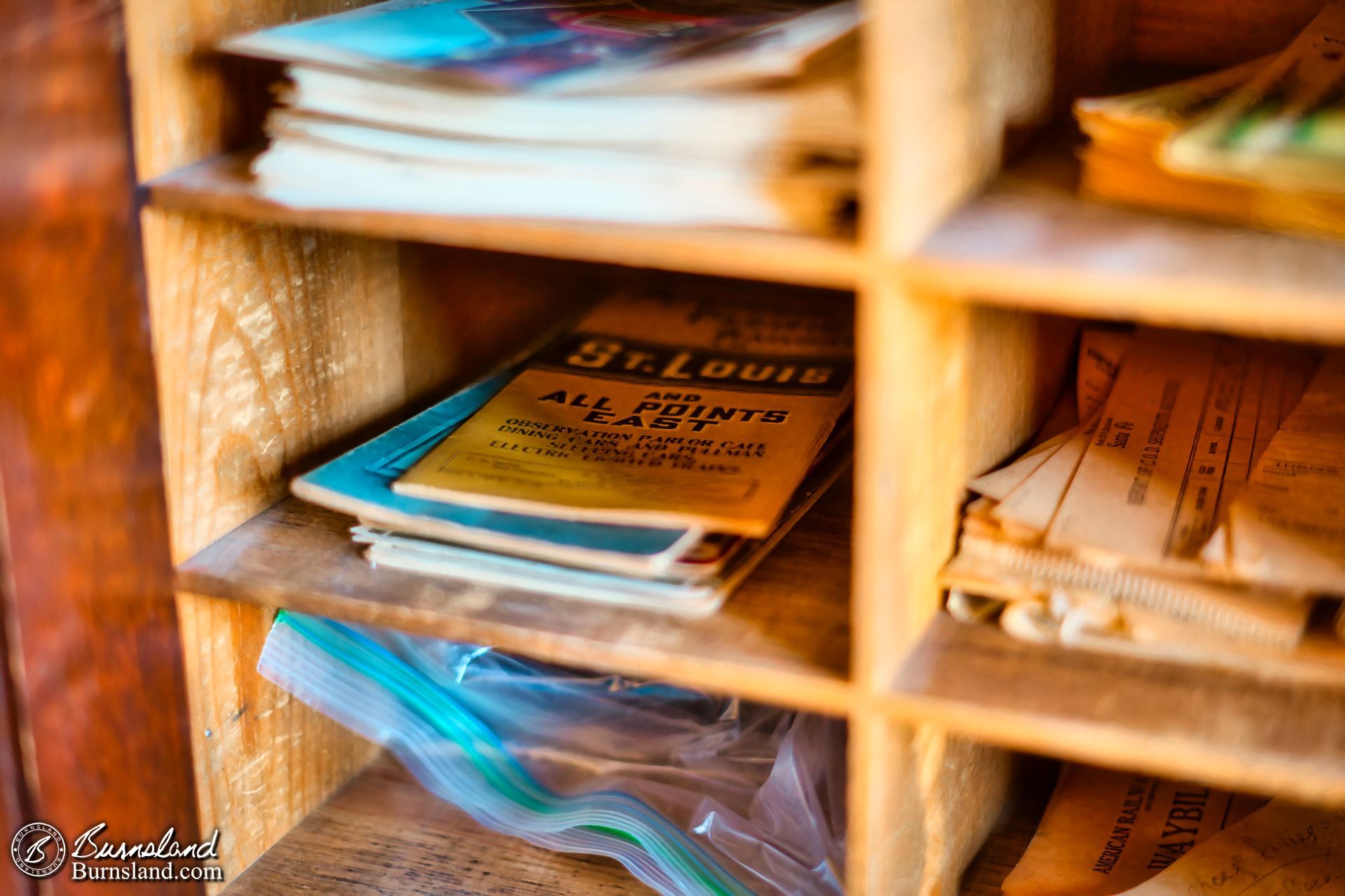 Books in the cubbies in the railroad depot in Alden, Kansas