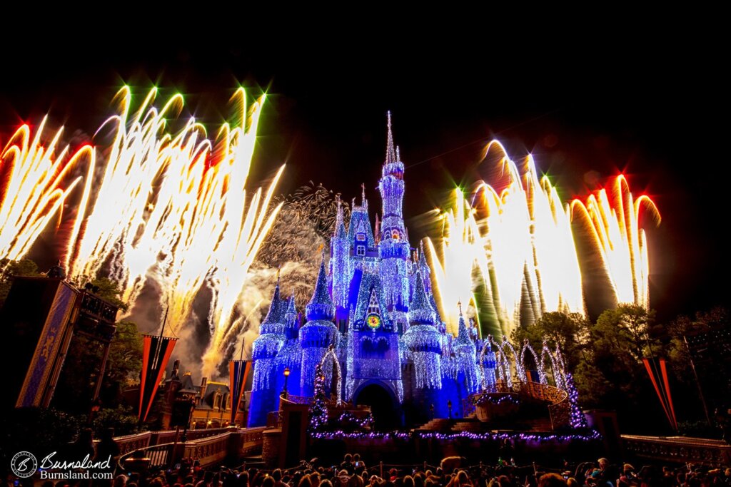 Fireworks flare up behind Cinderella Castle in Walt Disney World’s Magic Kingdom during the Holiday Wishes fireworks show in this Old Photo from December 2011.