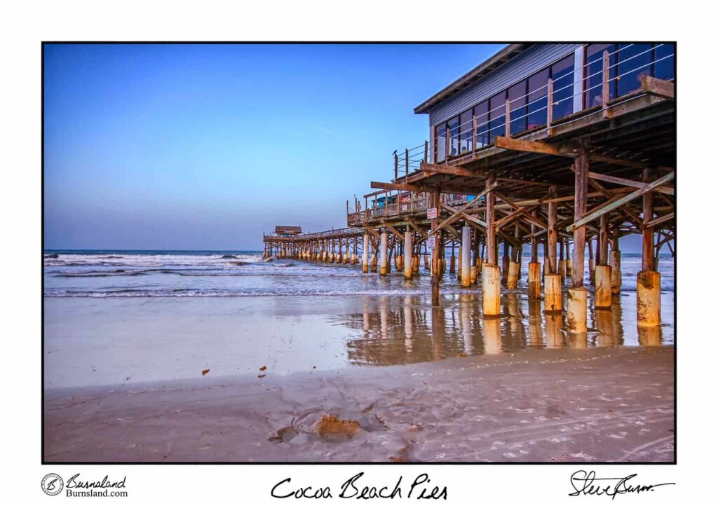 The Cocoa Beach Pier is surrounded by waves and illuminated by the early evening light in Cocoa Beach, Florida. Read all about it at Burnsland.