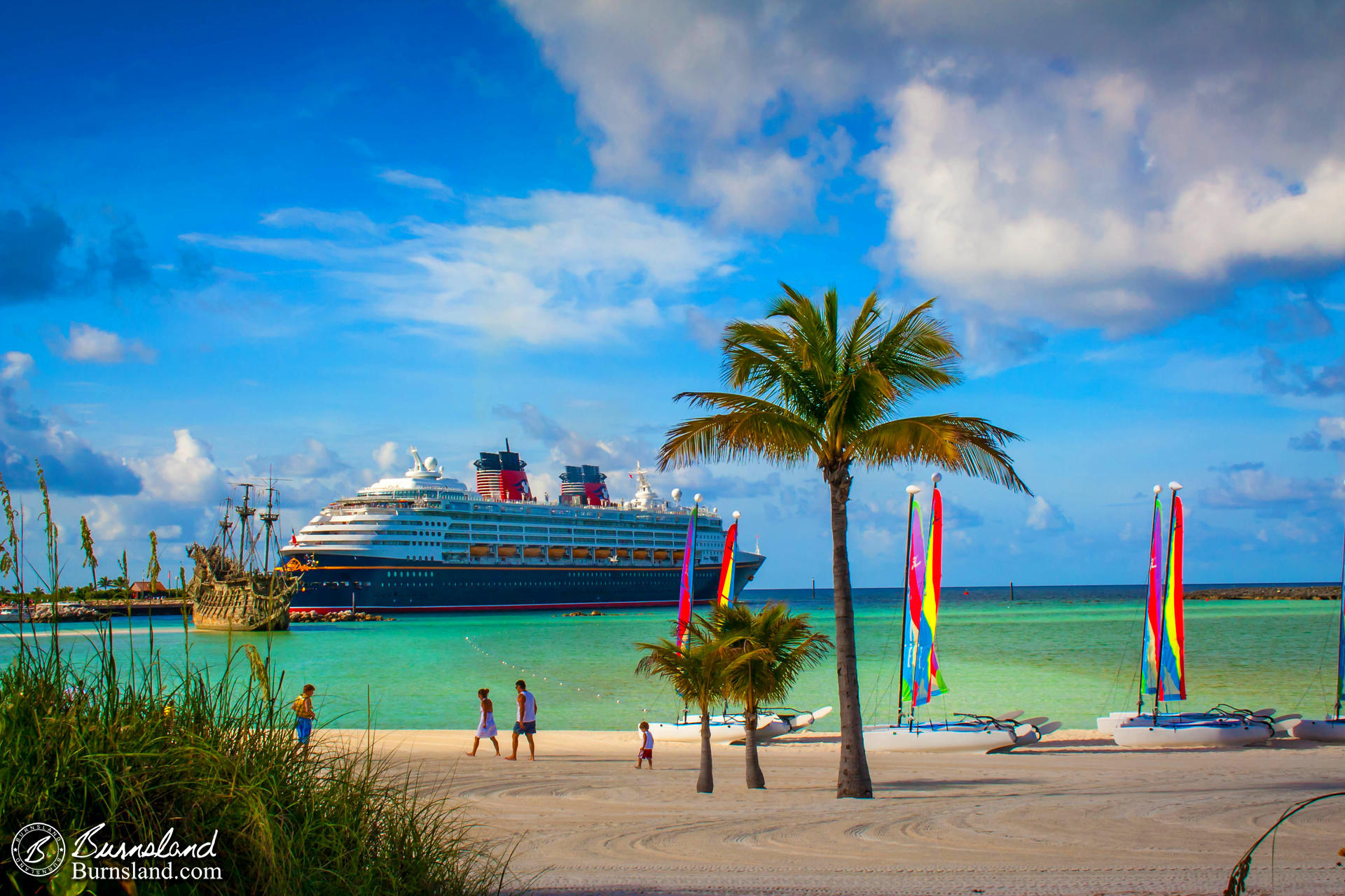 A view from 2007 of the Disney Cruise Line’s Disney Wonder behind the Flying Dutchman pirate ship at Castaway Cay, the private island of the Disney Cruise Line