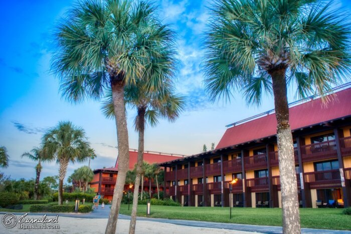 Palm trees surround the buildings at the Polynesian Village Resort at Walt Disney World